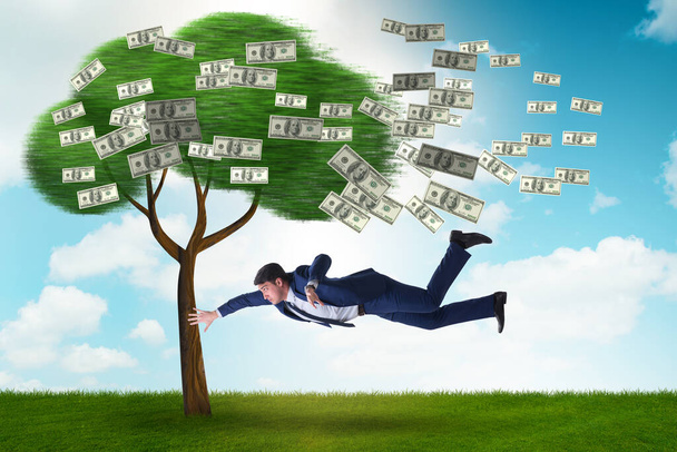 Empresario volado lejos del árbol del dinero - Foto, Imagen