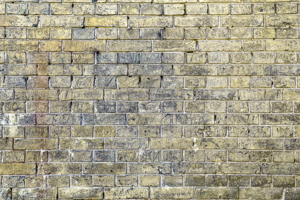 the background of the old yellow brick wall - Foto, Bild