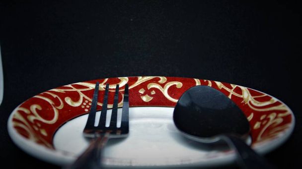 spoon and fork with black background - Photo, Image