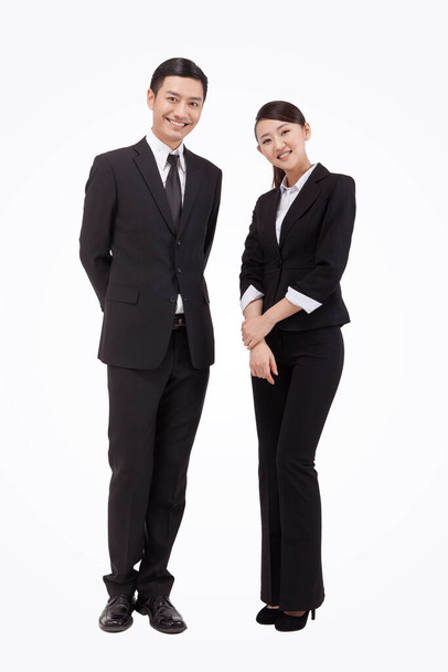 Young business man and woman - Fotó, kép