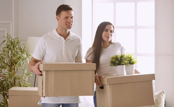 happy Young couple moving in new home - 写真・画像