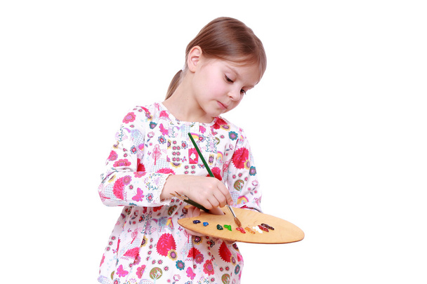 Cute little girl painting - Foto, imagen