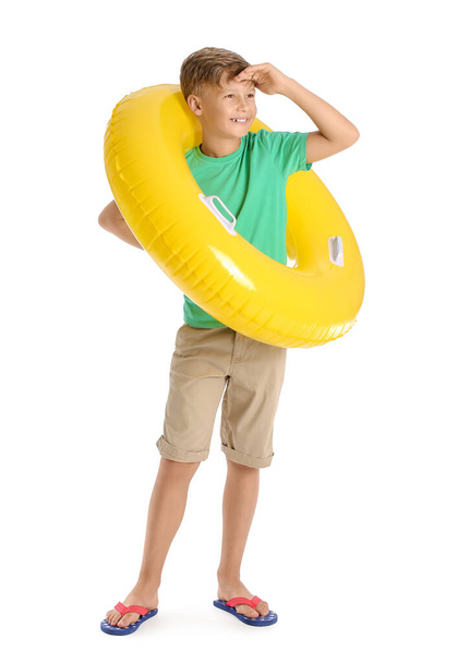 Cute little boy with inflatable ring on white background - Photo, Image