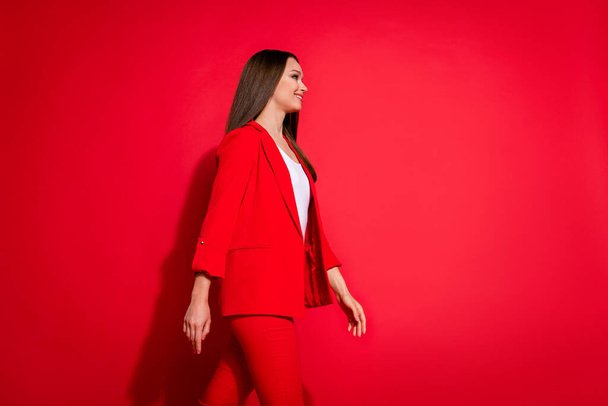 Profile photo of attractive business lady bossy successful person walk conference seminar wear luxury office blazer trousers suit white shirt isolated bright red color background - Foto, Bild