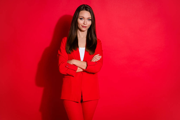 Photo of confident business lady hold arms hands crossed smiling without teeth successful person wear luxury office blazer trousers suit white shirt isolated vibrant red color background - Φωτογραφία, εικόνα