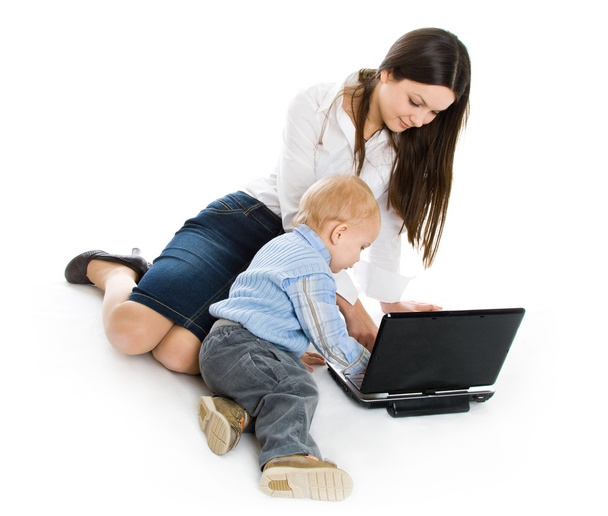 Mother and baby with laptop - Фото, изображение