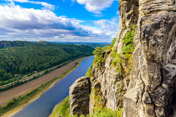 View from the bastei viewpoint of the Elbe river - beautiful landscape scenery of Sandstone mountains in Saxon Switzerland National Park, Germany - Photo, Image