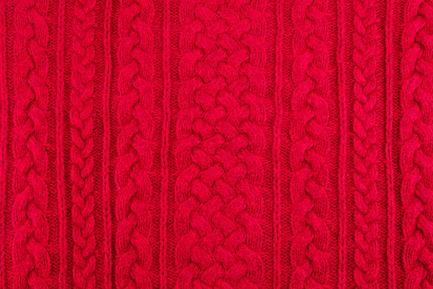 背景テクスチャ赤い編みケーブルリブパターン - 写真・画像