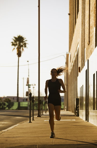 Woman out for a morning run - 写真・画像