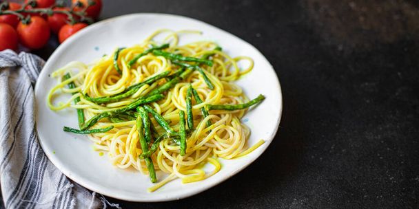 spaghetti green bean asparagus sauce cheese pasta second course vegetarian serving portion size top view copy space for text - Photo, Image