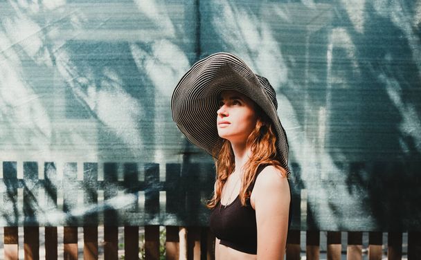Beautiful Girl in Hat at Sunlight - Fotoğraf, Görsel