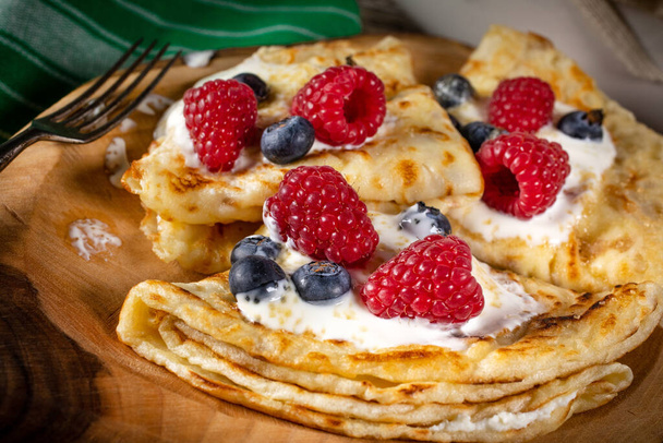 Homemade pancakes with white cheese and fruit. - Fotó, kép