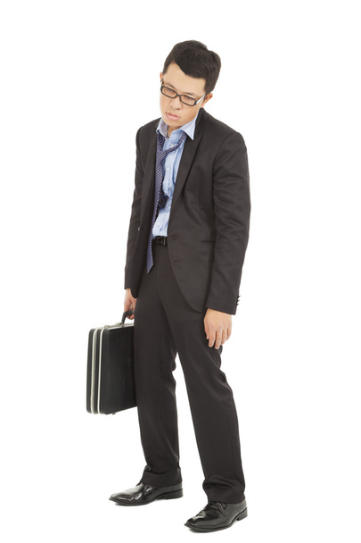 overwork and exhausted businessman holding briefcase - Valokuva, kuva