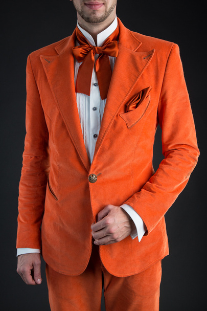 Orange suit orange bow tie - Foto, afbeelding