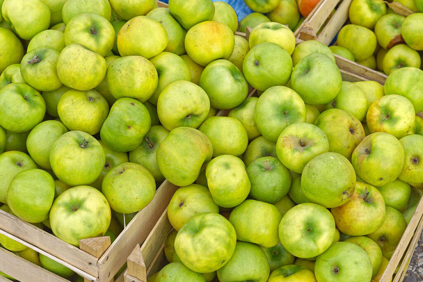 Organic green apples fruits in wooden crates - Photo, Image