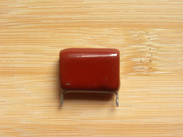 Red color ceramic Capacitor electronic component - Photo, Image