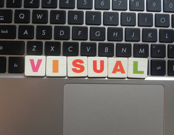 Word Visual auf Tastatur-Hintergrund - Foto, Bild