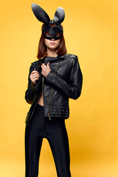 Sexy woman in rabbit mask and black suit, temptation - Fotografie, Obrázek