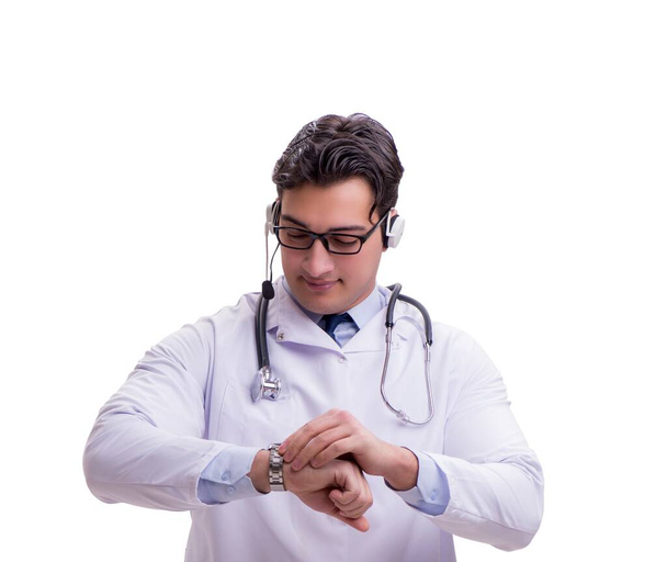 Jonge arts met telefoon headset geïsoleerd op wit - Foto, afbeelding