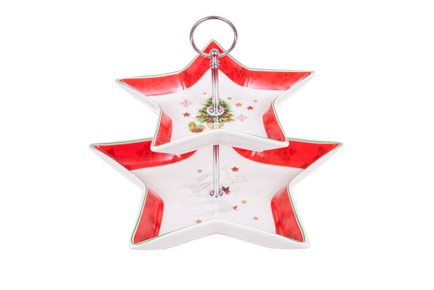 Taca dwupoziomowa z ozdobą świąteczną, w kształcie gwiazdy, izolowana na biało - Zdjęcie, obraz