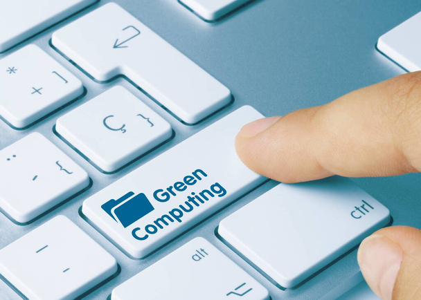 Зеленый цвет на синем ключе клавиатуры Metac. Нажатие пальца. - Фото, изображение