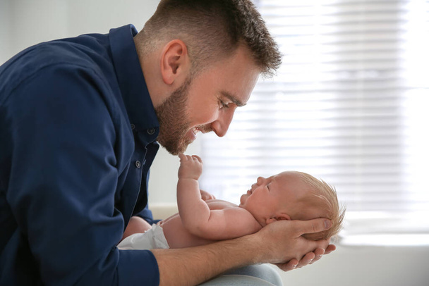 Father with his newborn son at home - Photo, Image