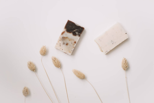 Handmade natural soap on white background. Soap making. Soap bars. Skin care. Natural Organic spa cosmetics products - 写真・画像