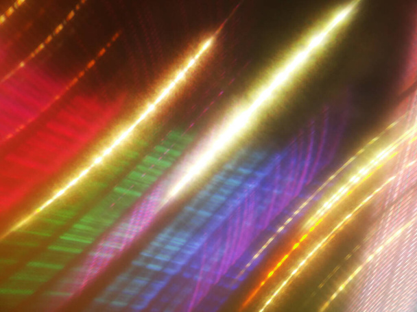 An abstract shot of colorful lights on a black background with cutting-edge shooting technology - Valokuva, kuva