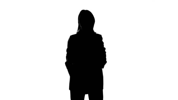 Footage of womans waiting silhouette in suit jacket with arms crossed - Footage, Video