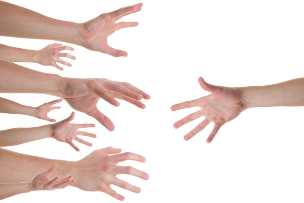 Hände, die nach einer helfenden Hand greifen - Foto, Bild