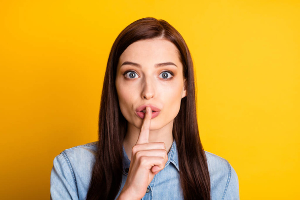Close up photo of serious girl put index finger lips ask dont share taboo secret wear good look clothes isolated over bright color background - Valokuva, kuva