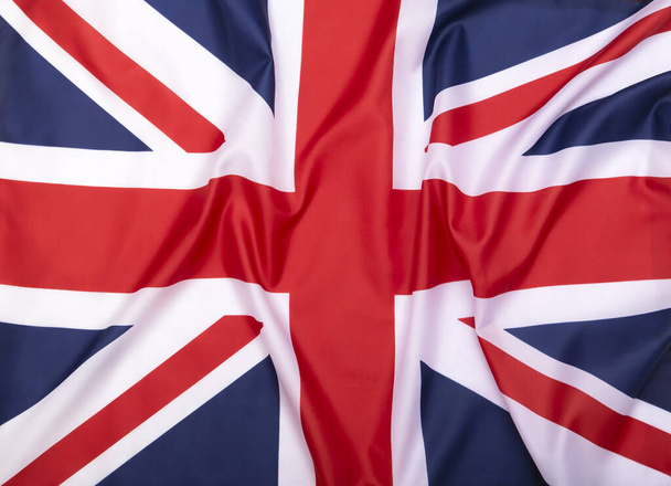 Fabric flag of the United Kingdom as background or texture - Foto, Bild