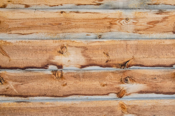 クローズアップ木製の表面。木製の梁で作られた古いフェンス。水平方向の板で木目の質感。木の質感とコピースペース. - 写真・画像