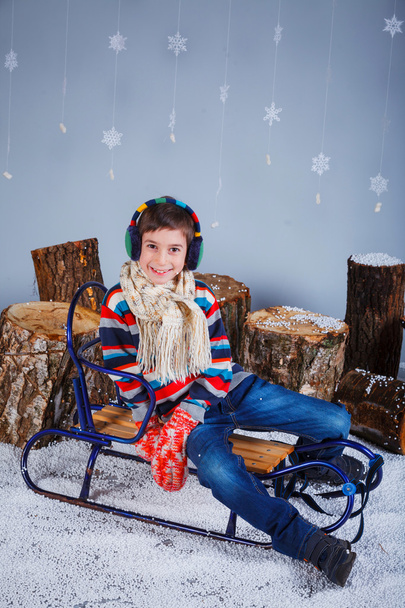 Funny boy in winter clothes - Foto, afbeelding