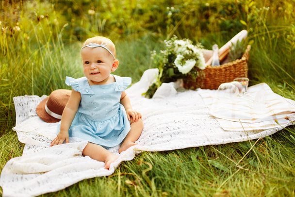cute  baby girl  in the park outdoors - Φωτογραφία, εικόνα