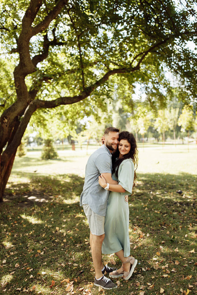 Beautiful happy  couple  in summer  park  - Photo, image