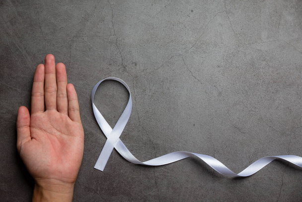 White ribbon symbol of peace International day of non violence. - Photo, Image