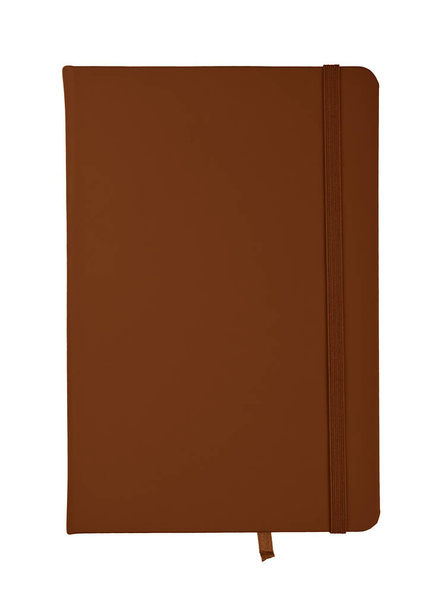Closed dark brown faux leather cover notebook isolated on white background, flat lay, directly above - Foto, afbeelding