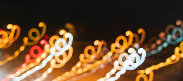 Blurry image of night lights on the street - Foto, immagini