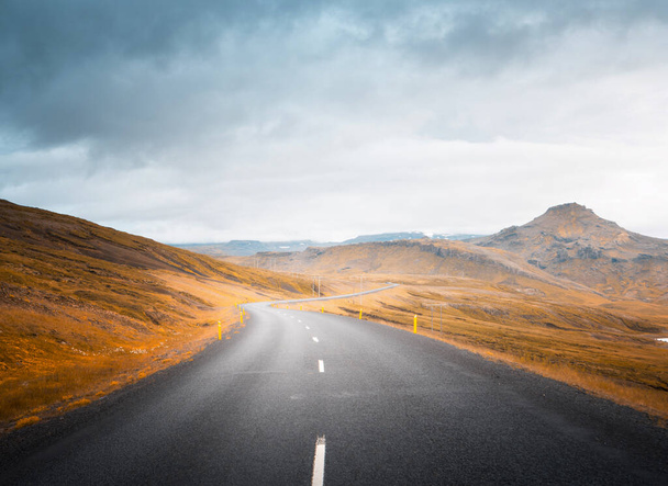Icelandic landscape with asphalt road - 写真・画像