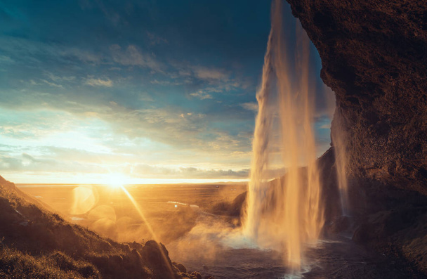 Seljalandsfoss waterfall at sunset, Iceland - Zdjęcie, obraz