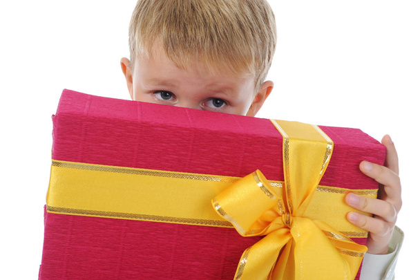 Boy holding present box - Фото, изображение