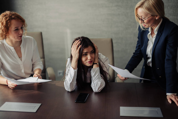 Desperate female office manager unable to cope with too many tasks from boss. - Foto, Imagem