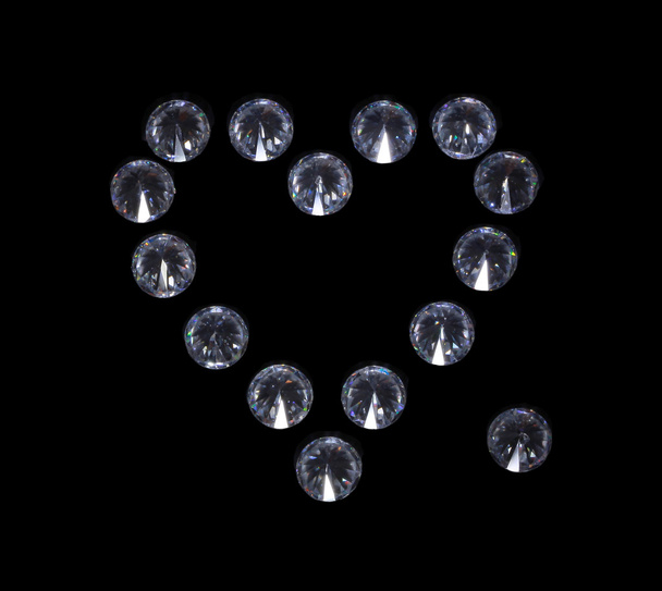 Corazón de Cristal. Fianitas redondas sobre espejo negro
 - Foto, Imagen