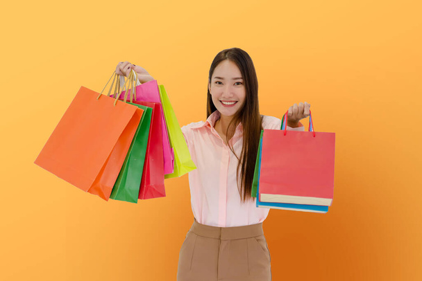 Female Shopper Lifestyle. Women Hobby. Luxury Boutique. Back View Of Rich  Lady Holding Blank Brand Name Mockup Packages. Stock Photo, Picture and  Royalty Free Image. Image 123667874.