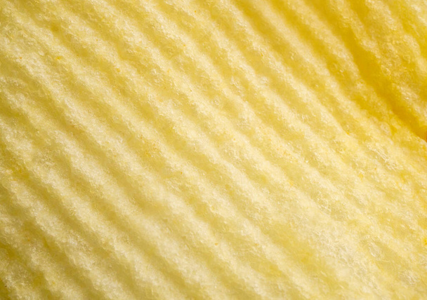 Potato chip pattern texture background closeup - Фото, зображення