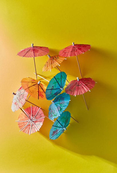 cocktail umbrellas on a bright background - Foto, immagini