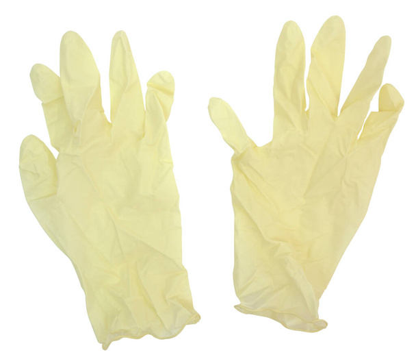 Disposable latex gloves. Isolated on white. Horizontal. - Photo, Image