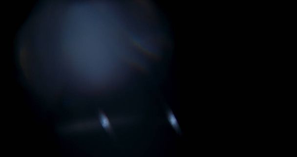 プリズムレインボーライトフレアがブラックを背景にオーバーレイ - 写真・画像