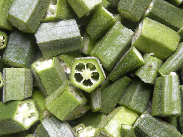 Snijd doorsnede detail van groene kleur rauw verse Okra - Foto, afbeelding